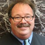 Official portrait of Chief Judge Shawn Crane, Sixth Judicial Circuit of Florida.